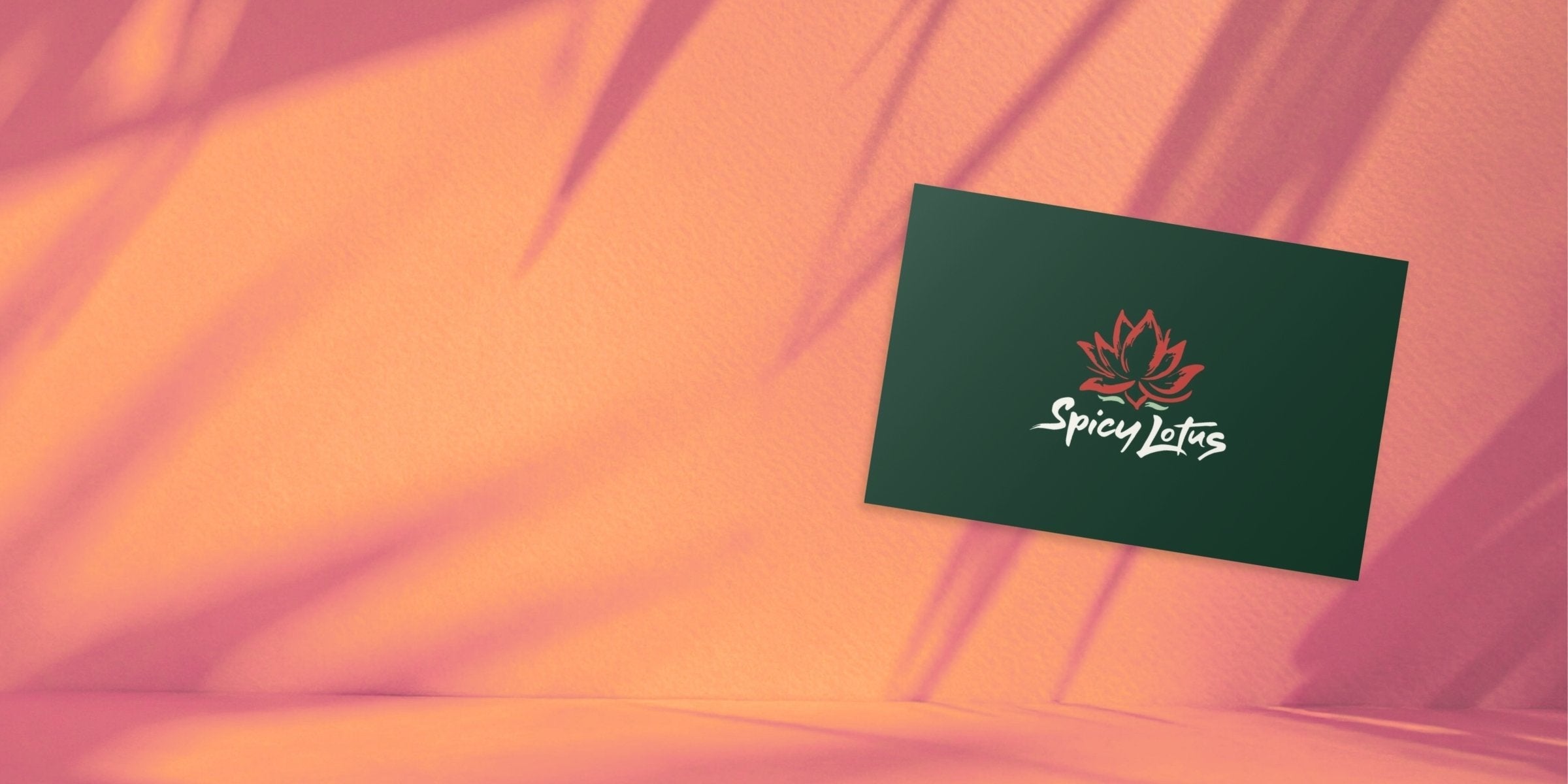 Orange red tropical background with soft leaf shadows and green Spicy Lotus Gift Card.