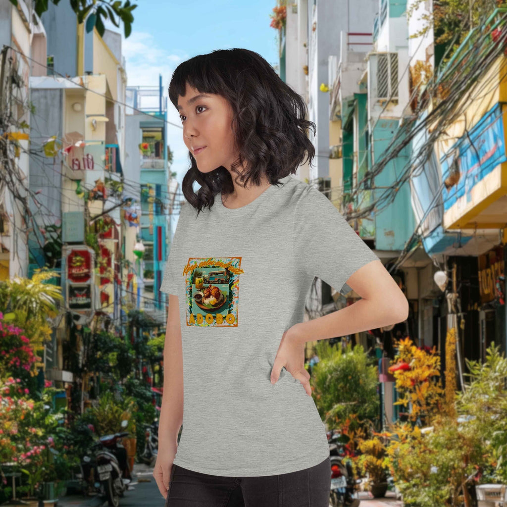 Model wearing Keep Calm and Eat Adobo t-shirt in casual urban street setting