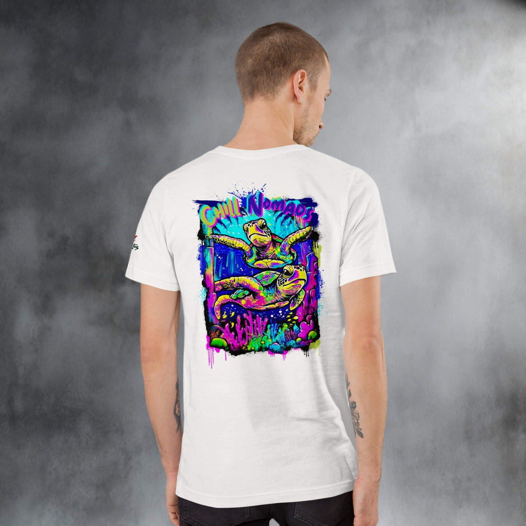 Person wearing a white t-shirt with a colorful graphic of graffiti turtles on the back against a gray background