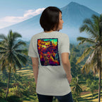 Person wearing a t-shirt with a colorful graphic design in a tropical setting with a volcano and palm trees and rice terraces in Bali