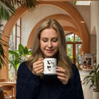 Woman in an aestethic café with relaxed urban vibe in Bali holding a brewtally good ceramic mug in her hand