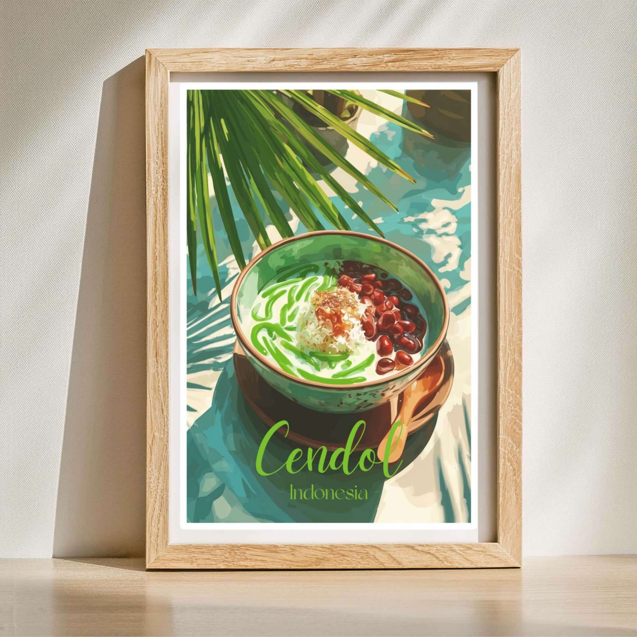 Framed artwork of a cendol dish with tropical leaves on a light background in wooden frame