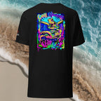 Black turtle t-shirt with colorful graphic design on a beach background
