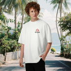 Model wearing Graffiti Reef tee during urban beach or street stroll front