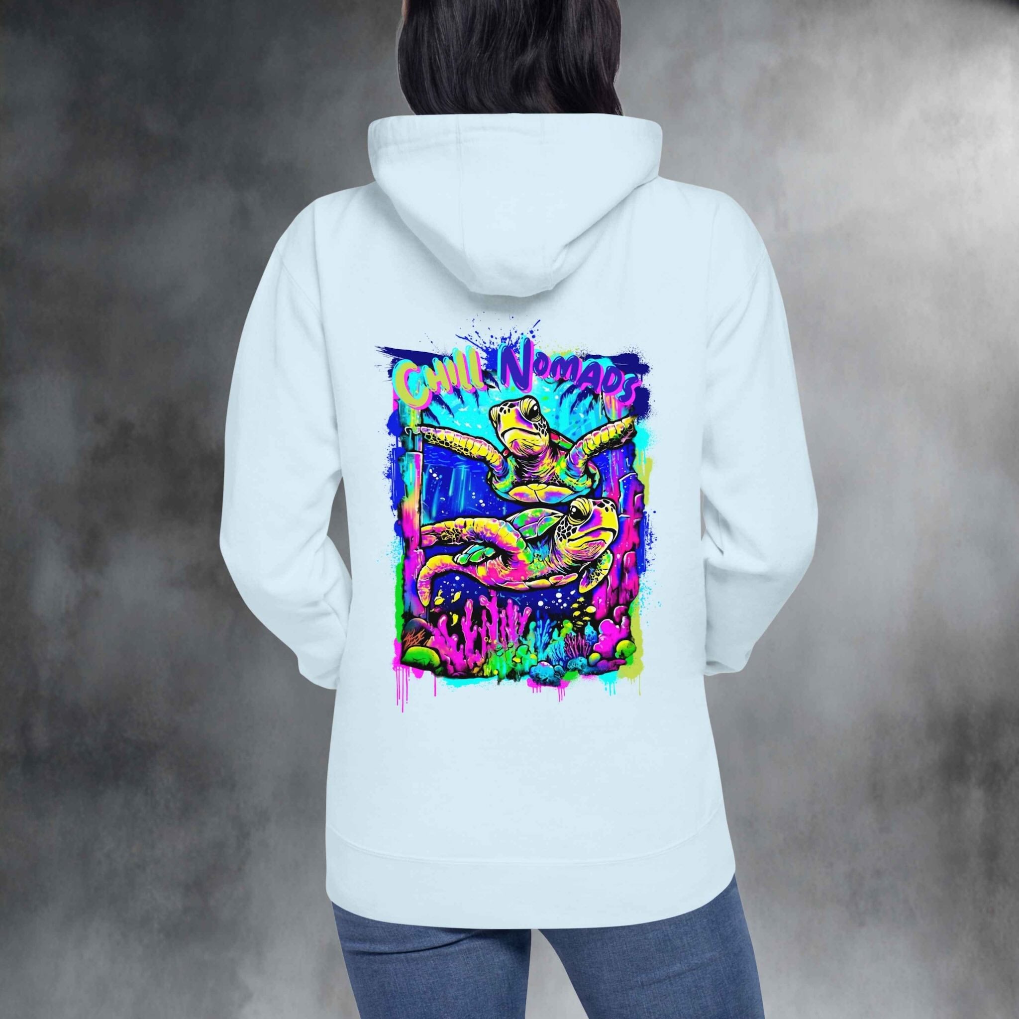 Back print of Chill Nomads hoodie featuring neon sea turtle and coral reefs studio clean