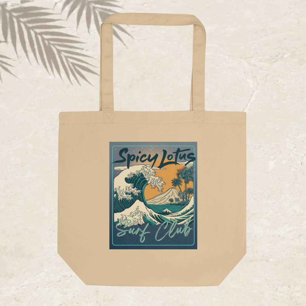 Beige tote bag with 'Spicy Lotus Surf Club' design on a light background