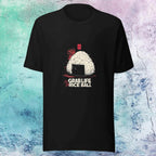 Black t-shirt with a graphic of a rice ball and text on a textured blue and white background