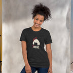 Woman wearing a black t-shirt with a graphic design of japanese onigiri  with a pun on a plain background
