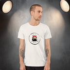 Man wearing a white t-shirt with a graphic design of onigiri rice ball with pun on a dark background