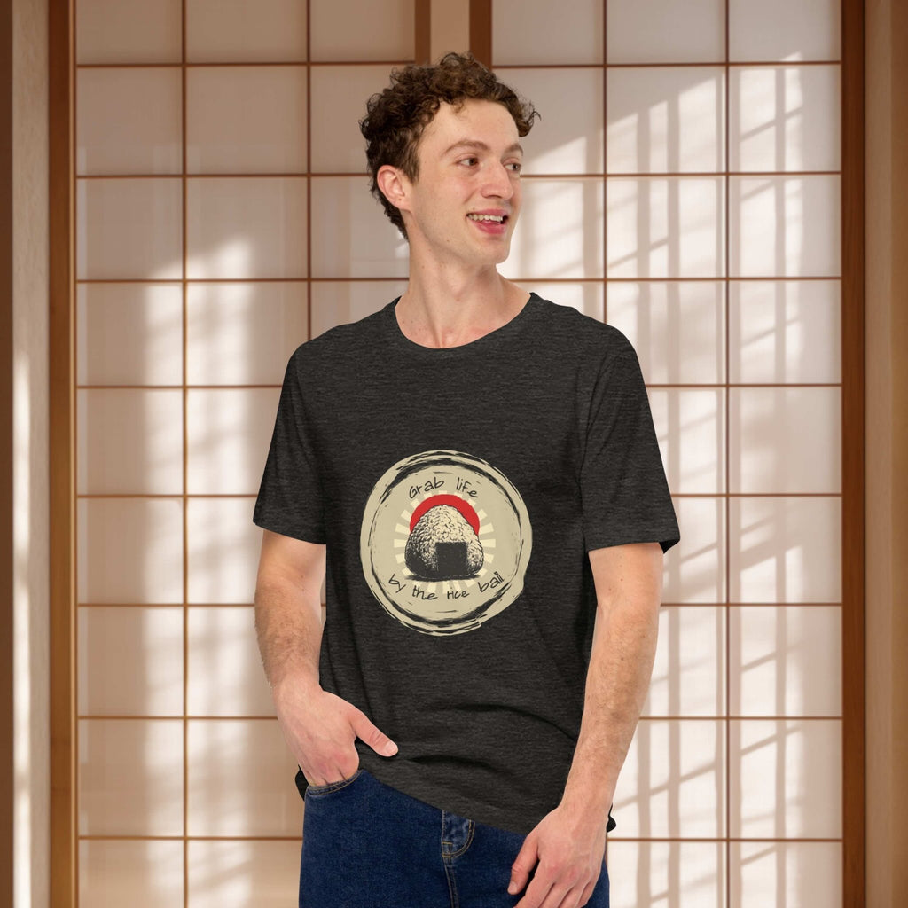 Man wearing a black t-shirt with a ongiri graphic design, standing against a japanese wooden paravent..