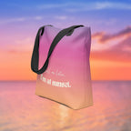 Tote bag with 'Call me later, I'm at sunset' text against a colorful sky background