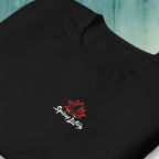 Folded Bella+Canvas 3001 unisex back print tee with chest logo