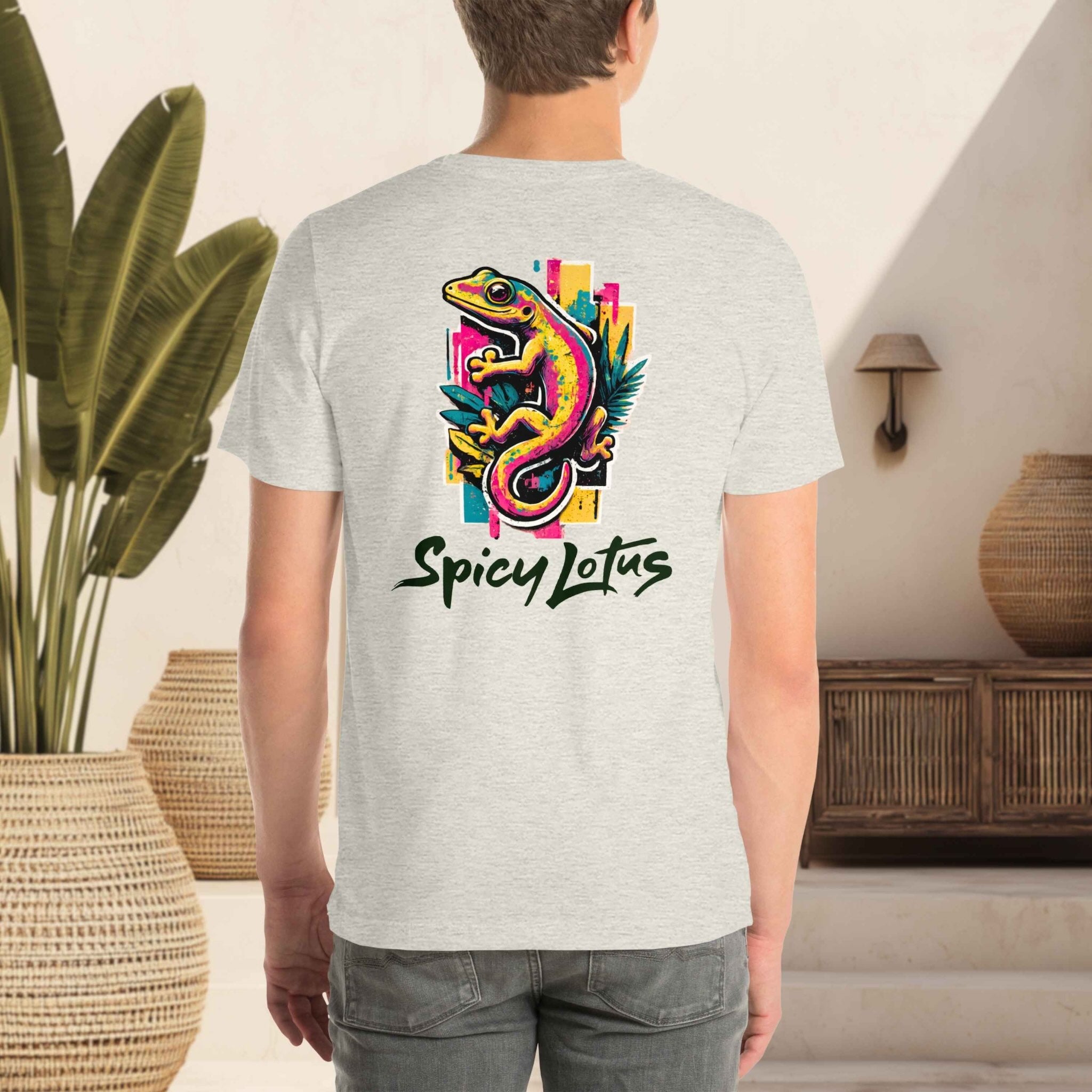 Person wearing a gray t-shirt with a colorful lizard design and 'Spicy Lotus' text.