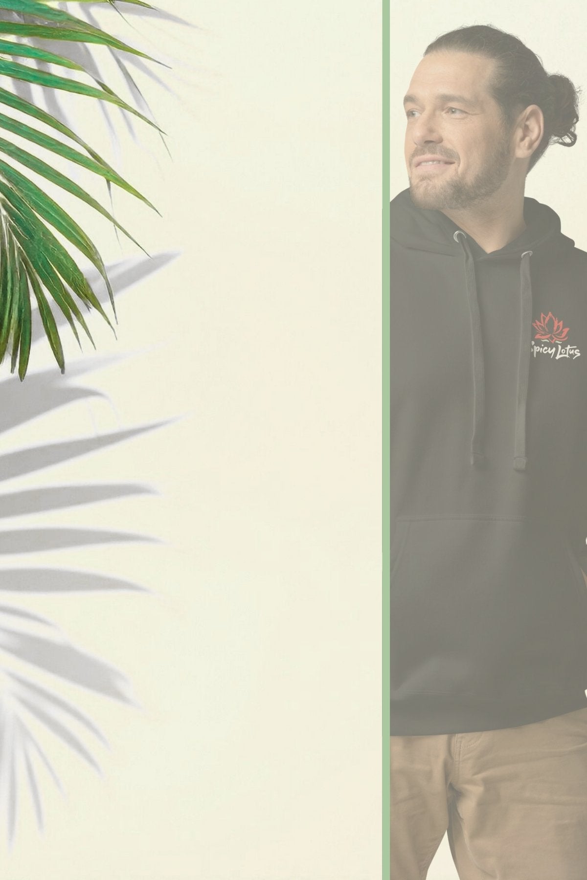 Man wearing a black Spicy Lotus hoodie with a logo, standing against a light green background with plant leaves.