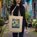 Woman holding a tote bag with 'Spicy Lotus Surf Club' design in an urban setting.