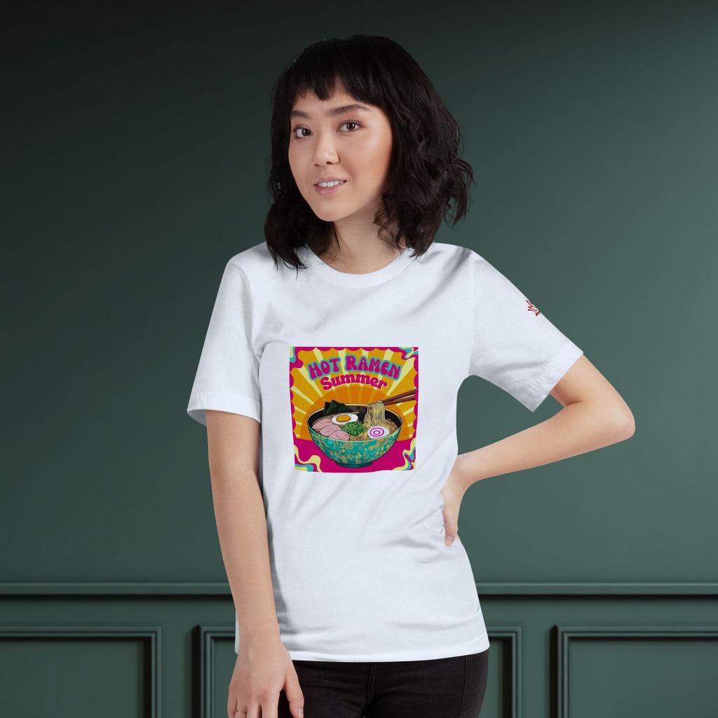 Person wearing a white t-shirt with a colorful ramen graphic design on a dark green background