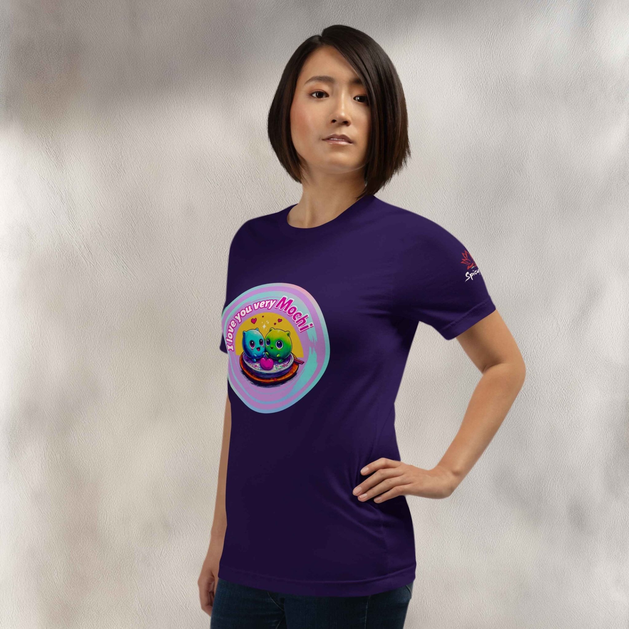 Person wearing a purple t-shirt with a colorful graphic design of a cute mochi couple on a plain background