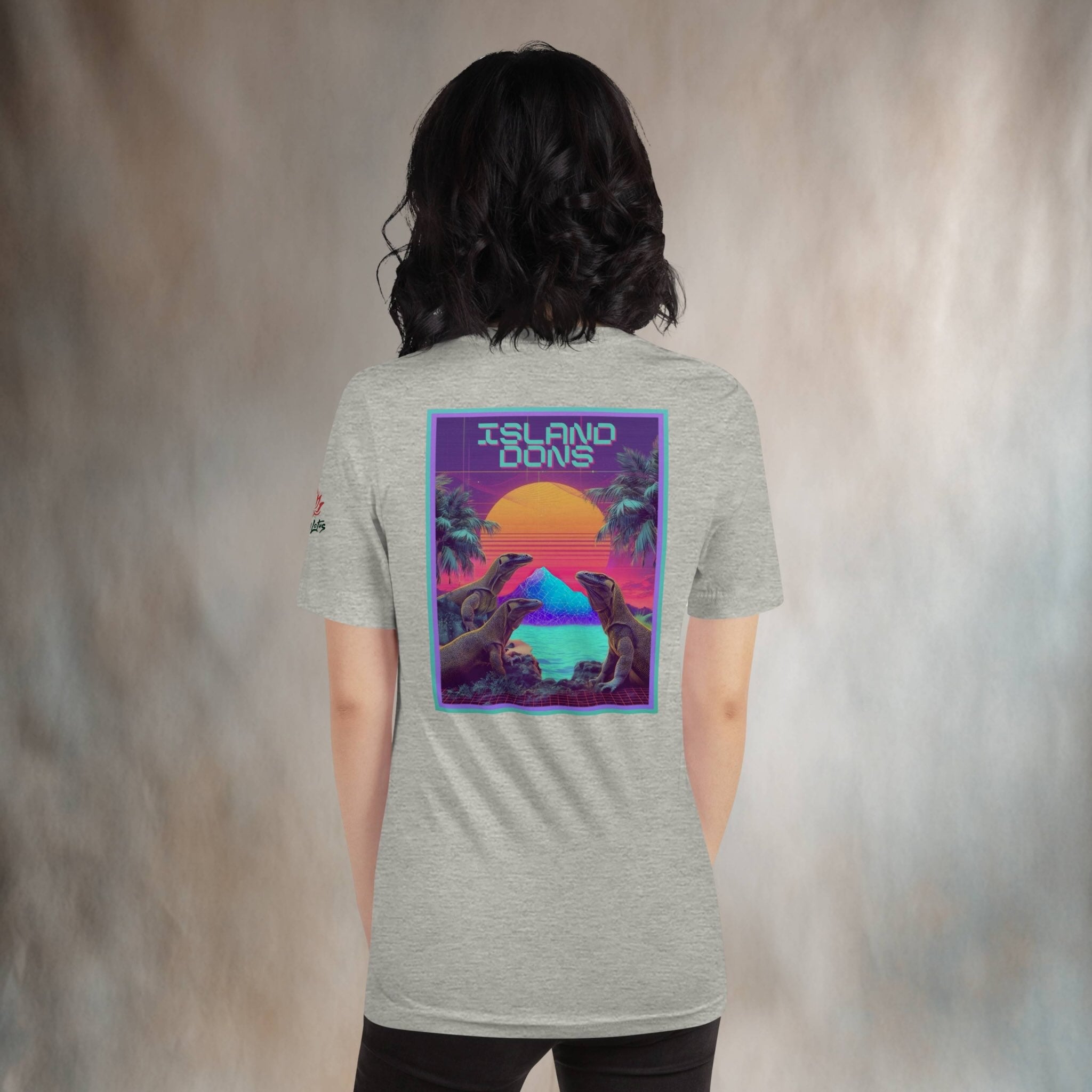 Island Dons Komodo Nights back print t-shirt on a woman in a studio 