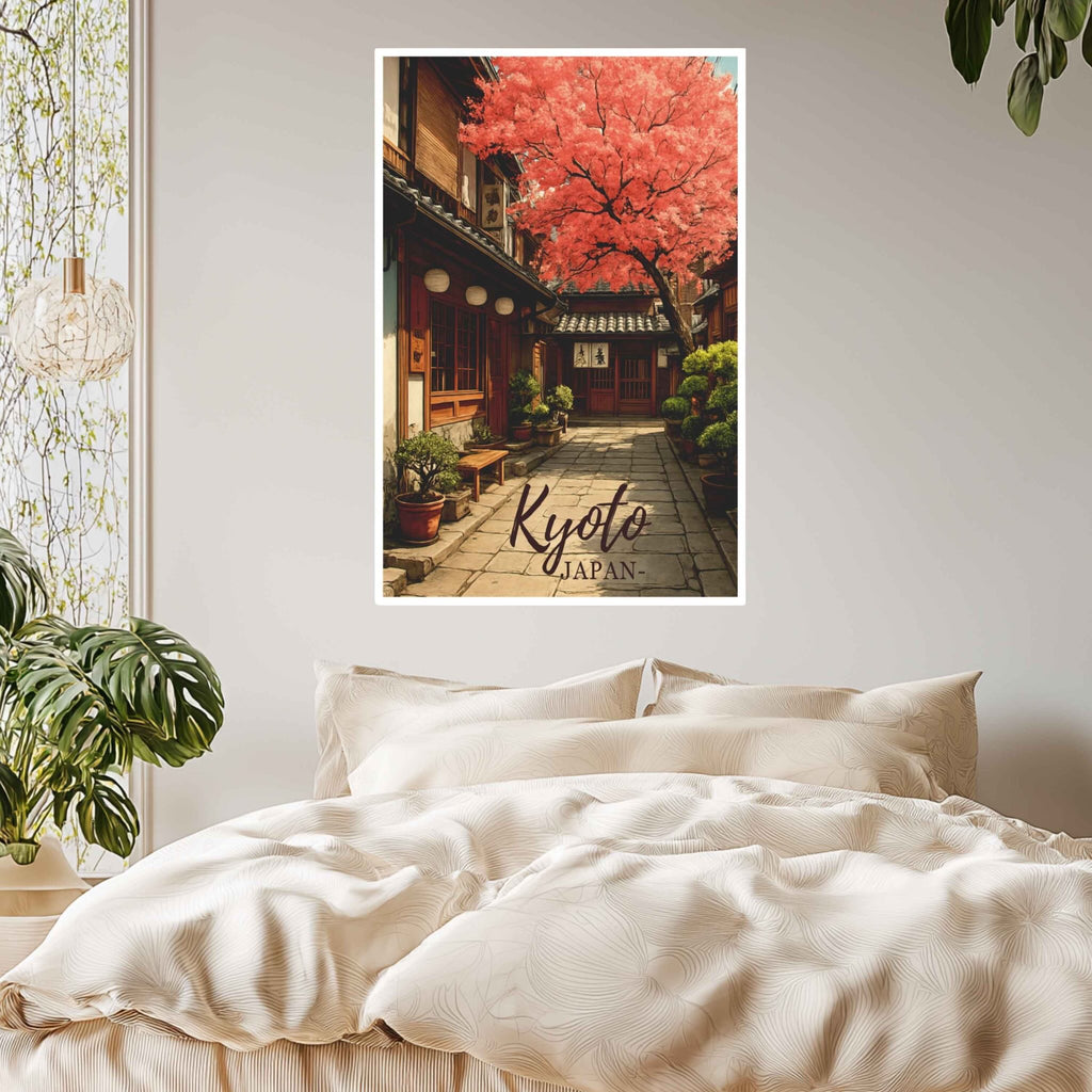 Poster of a Kyoto, Japan scene above a bed in a room with plants.