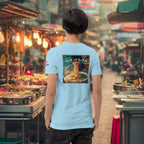 Model wearing Mie-ssion Accomplished t-shirt at urban night market
