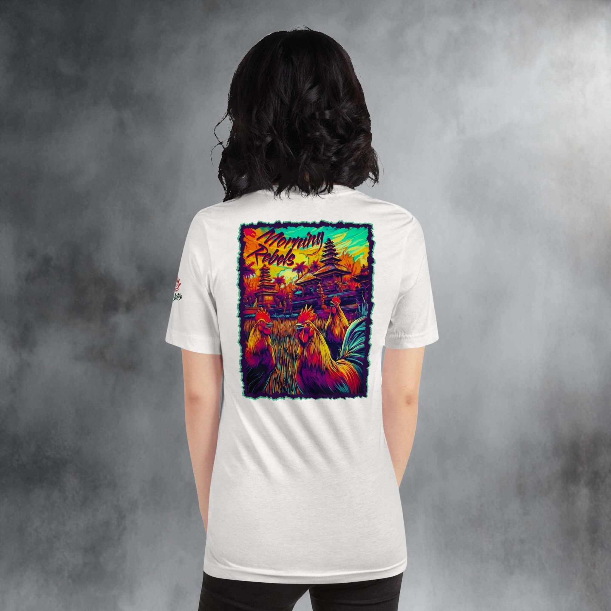 Morning Rebels Dawn Dynasty Bali Rooster back print T-shirt on a woman standing in a studio with grey walls