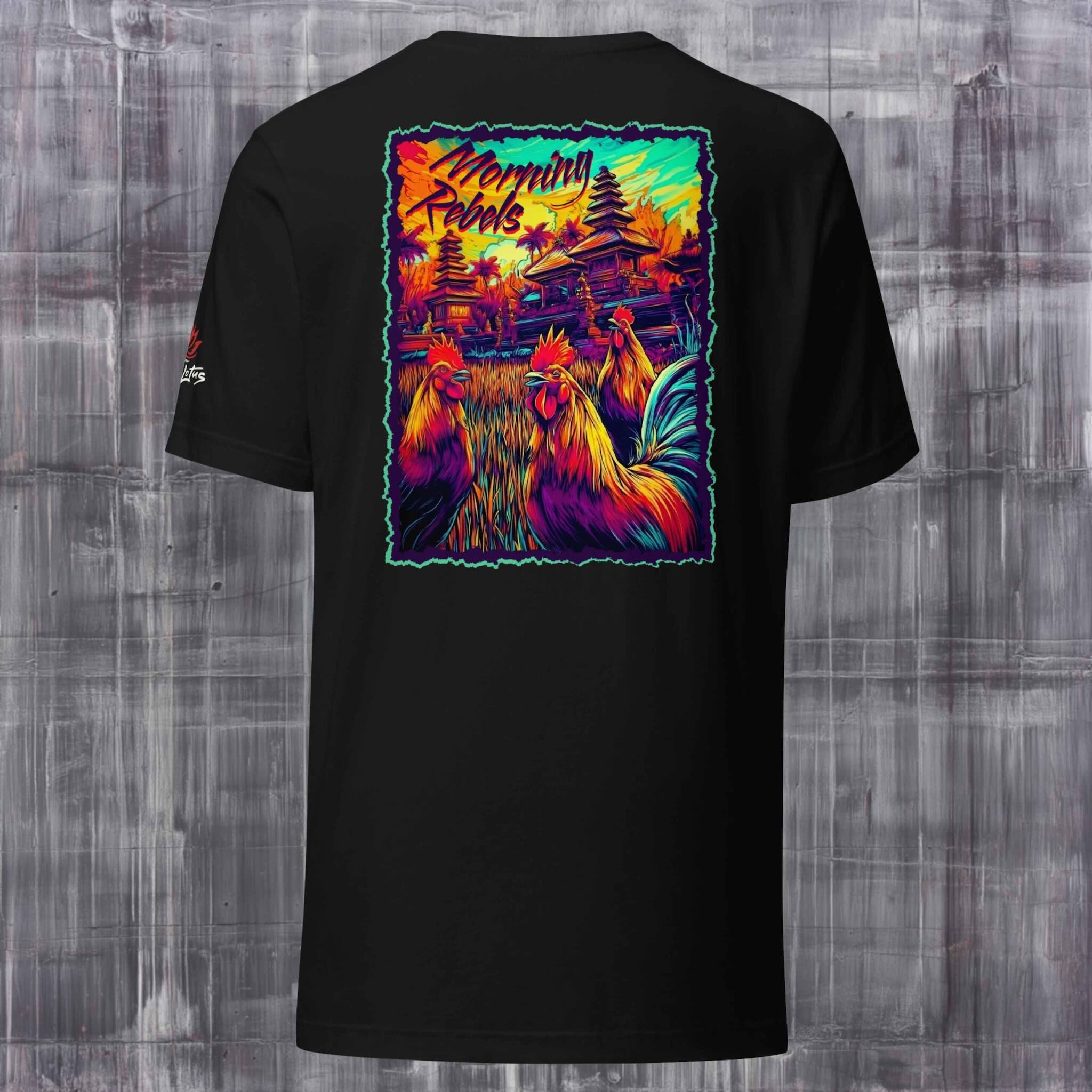 Black t-shirt with colorful rooster design and 'Morning Rebels' text on a wooden surface