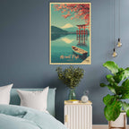 Poster of Mount Fuji with cherry blossoms and a boat on a blue lake, hanging on a blue wall above a bed.