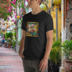 Person wearing a black t-shirt with a colorful Nasi Lemak graphic design in an outdoor setting.