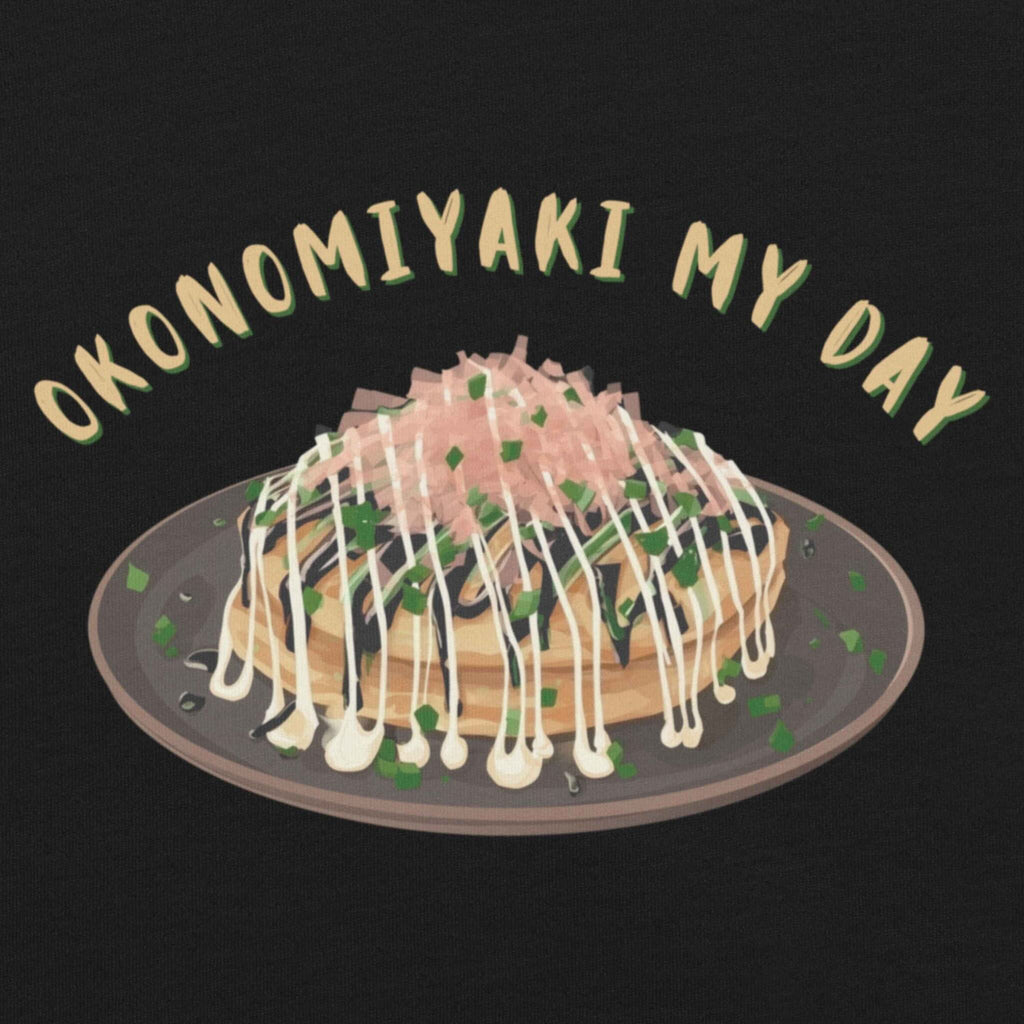 Illustration of okonomiyaki with a text 'OKONOMIYAKI MY DAY' on a black T-shirt background