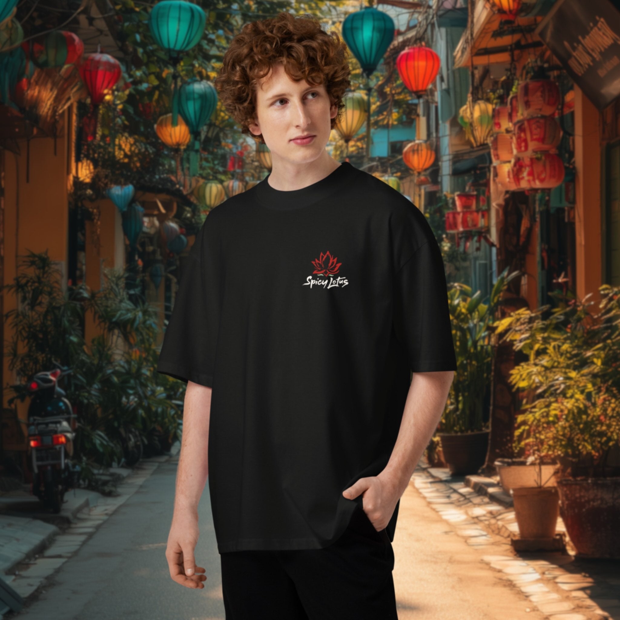 Person wearing a black t-shirt with a logo in an outdoor setting with colorful lanterns in Hoi An