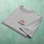 Folded Roll With Us tee showing chest Logo print