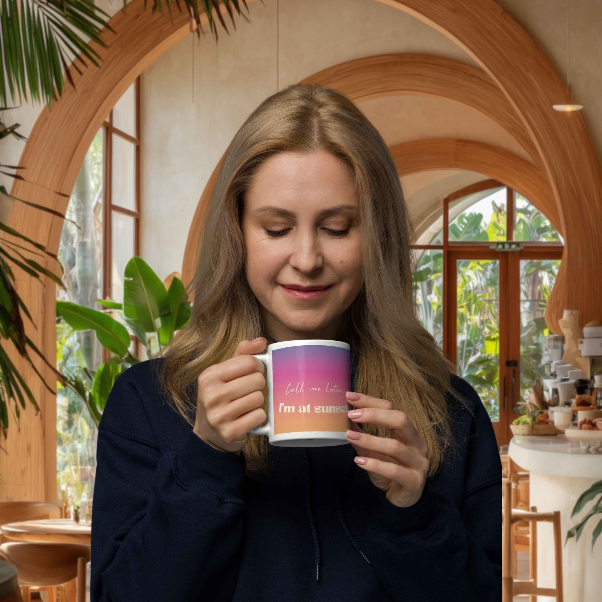 Woman holding a mug with text in a cozy indoor setting