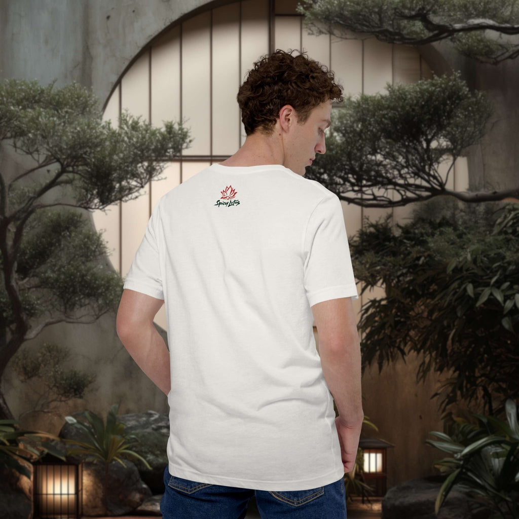 Person wearing a white t-shirt with a logo in a japanese outdoor setting with plants and lanterns.
