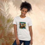 Woman wearing a white t-shirt with a colorful graphic design of Lemak It Happen Nasi Lemak pop art front print against a beige background with leaf patterns.