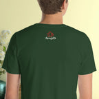 Person wearing a green t-shirt with a logo on the back against a light yellow background