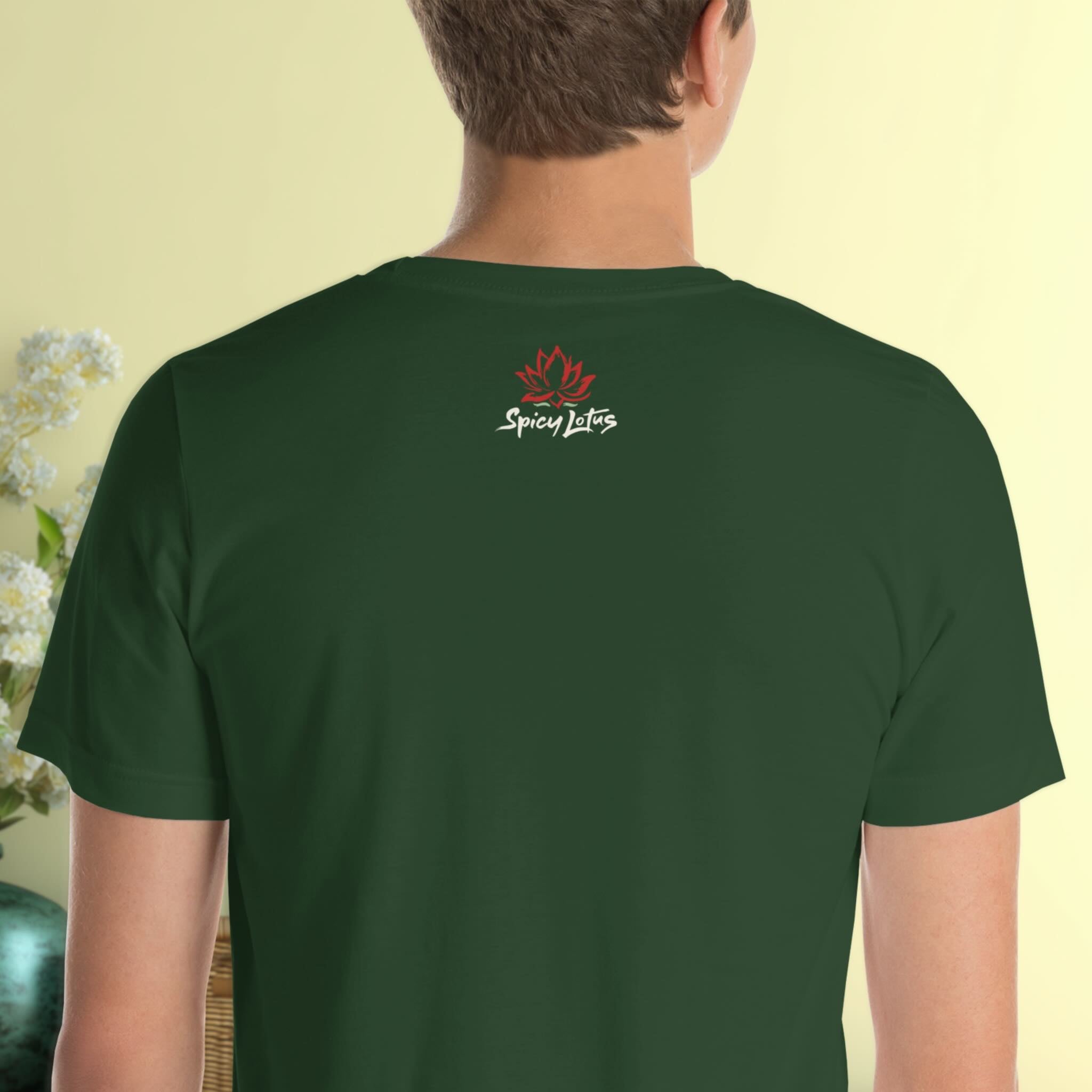 Person wearing a green t-shirt with a logo on the back against a light yellow background