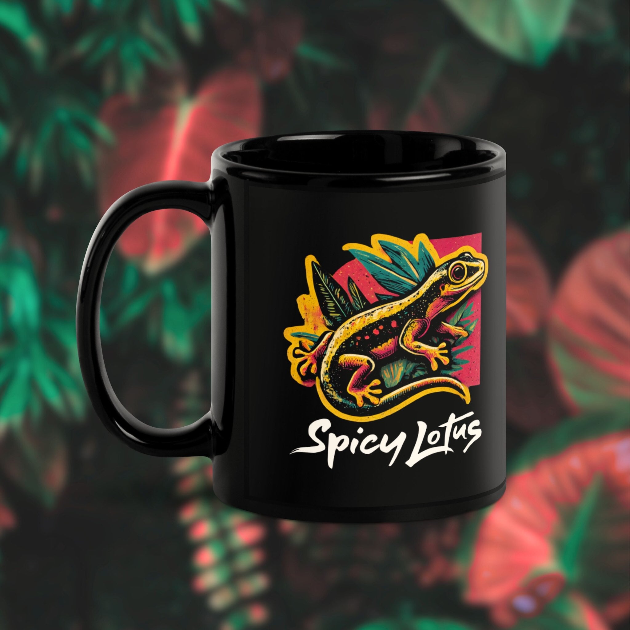 Black mug with a colorful gecko design and 'Spicy Lotus' text on a leafy background