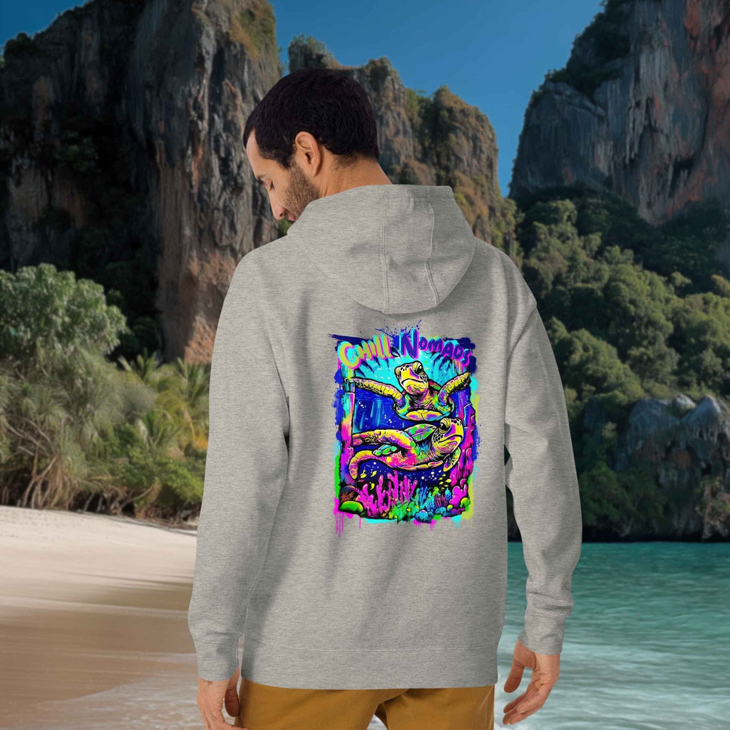 Model wearing Chill Nomads hoodie by oceanfront
