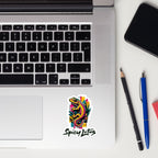 Colorful sticker with 'Spicy Lotus' logo on a laptop