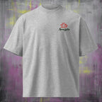 Small left chest logo on Roll With Us oversized organic tee