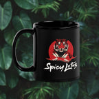 Black mug with a tiger design and 'Spicy Lotus' text on a green leafy background