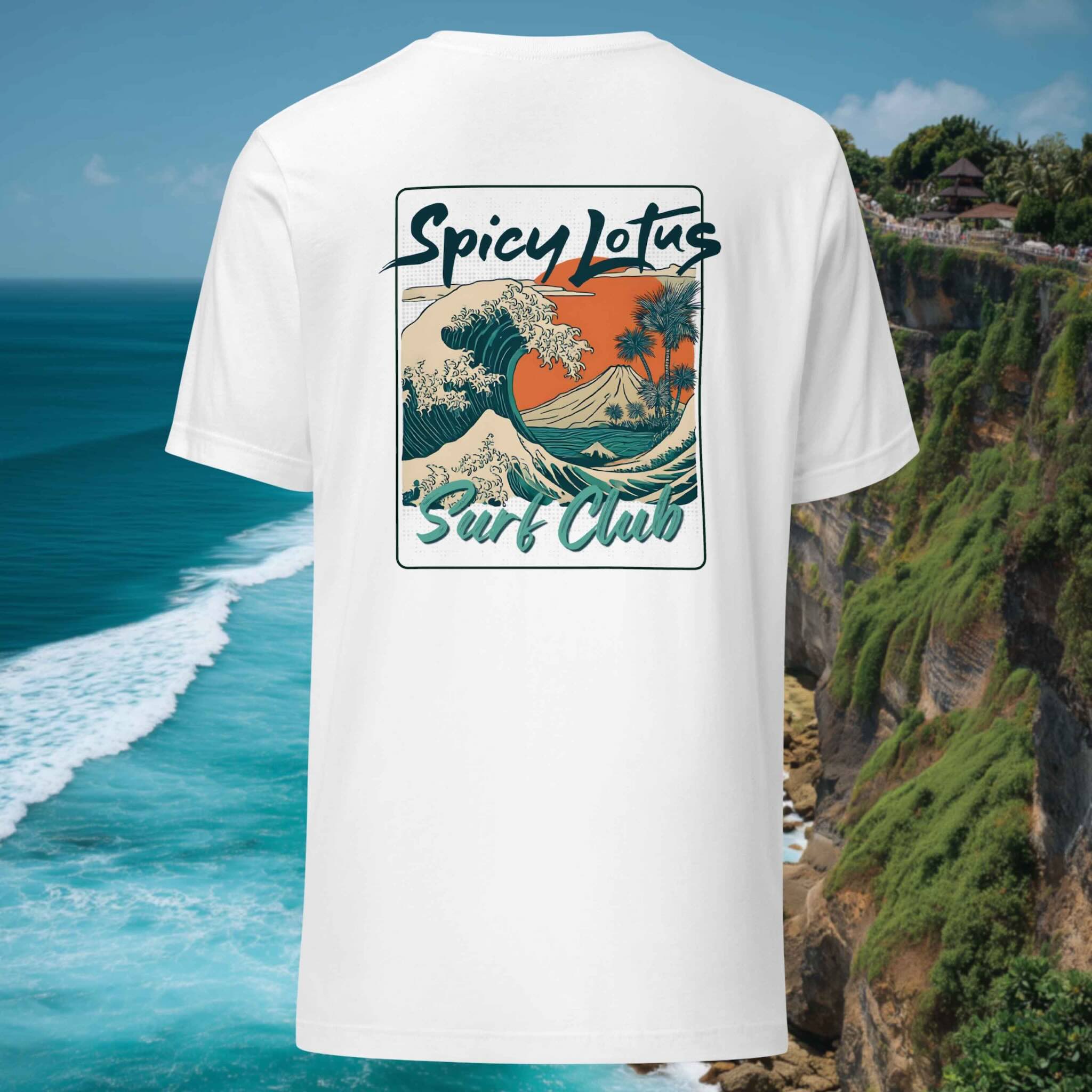White t-shirt with 'Spicy Lotus Surf Club' design against a scenic ocean backdrop