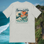 Surf and waves Back DTG print Bella+Canvas 3001 unisex flatlay T-shirt in front of Uluwatu cliffs in Bali