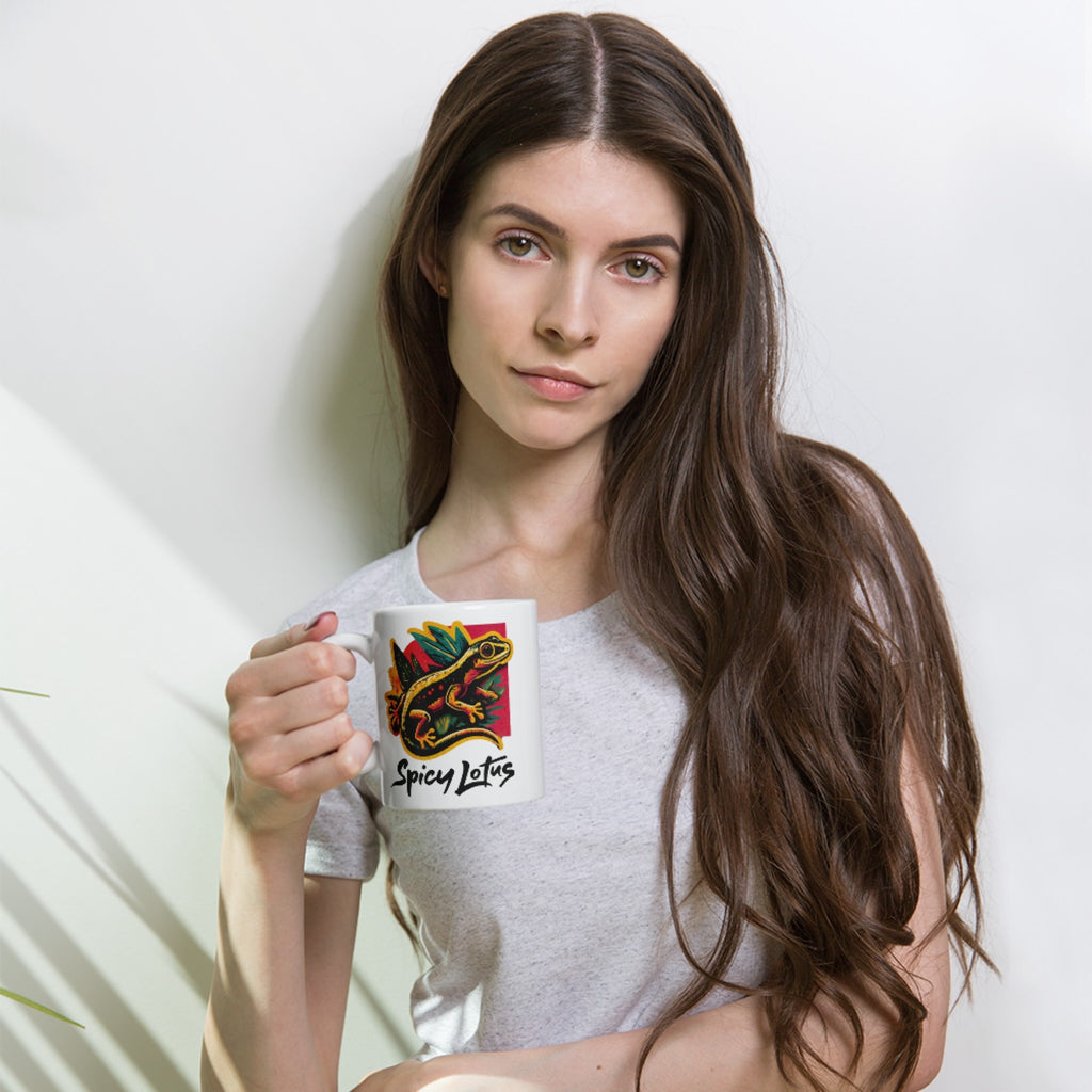 Woman holding a mug with a colorful design and text against a plain background