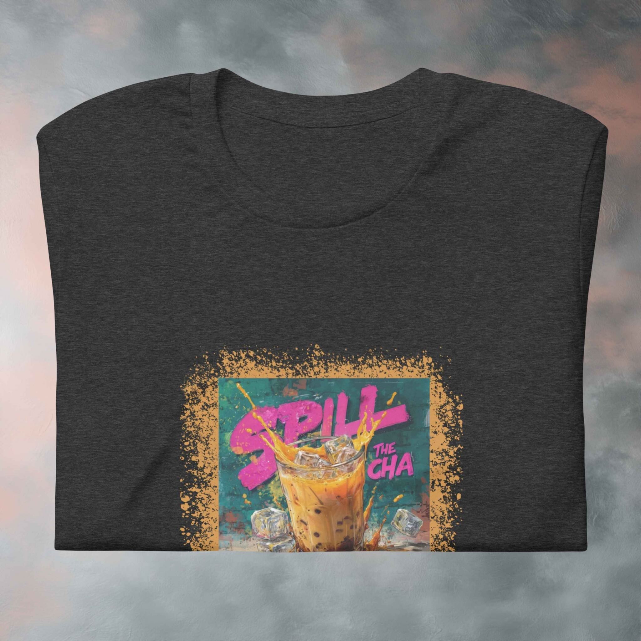 Folded Spill the Cha street art graphic with thai milk tee graffiti style t-shirt