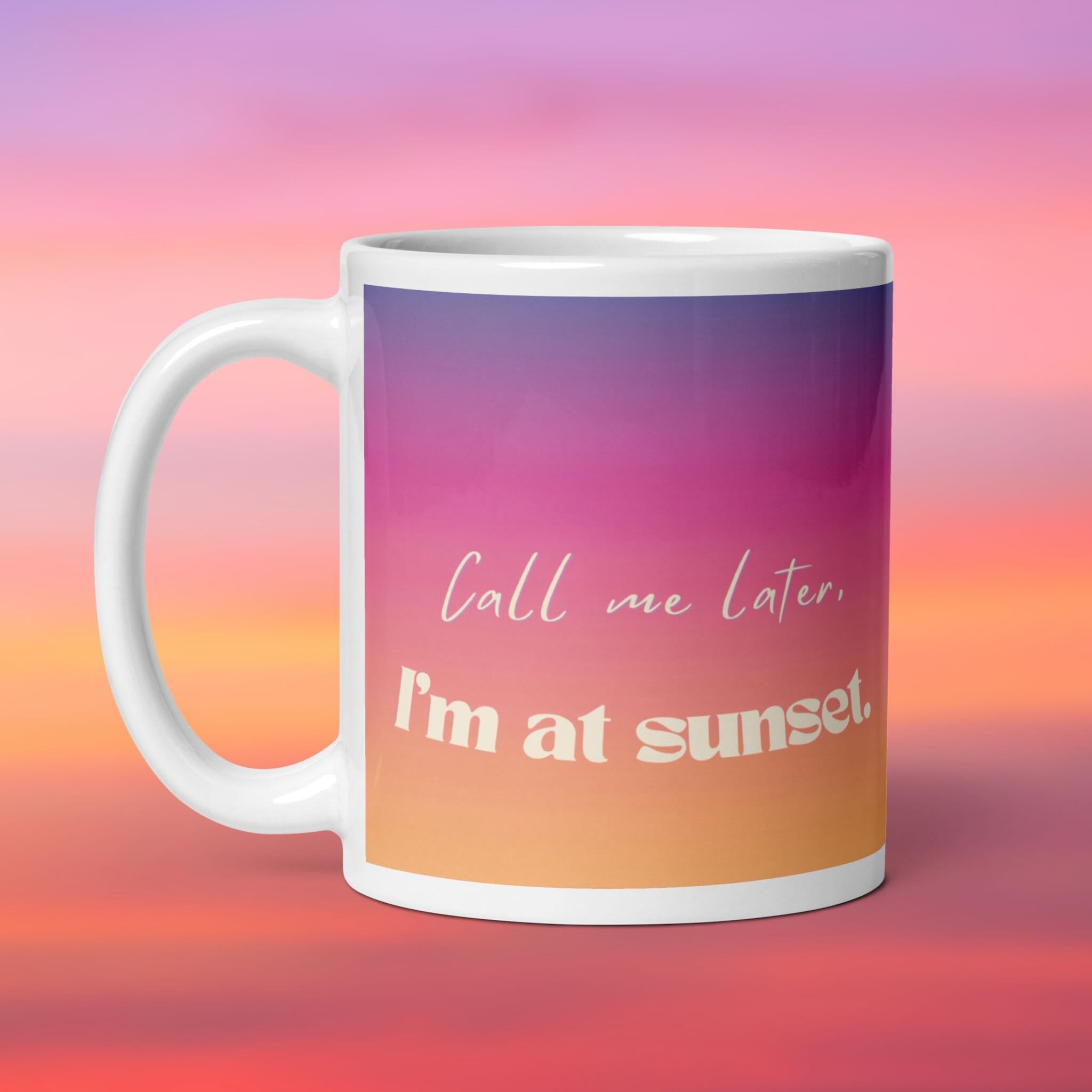 Mug with 'Call me later, I'm at sunset' text on a gradient background