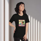 Person wearing a black t-shirt with colorful graphic design of cute mochis