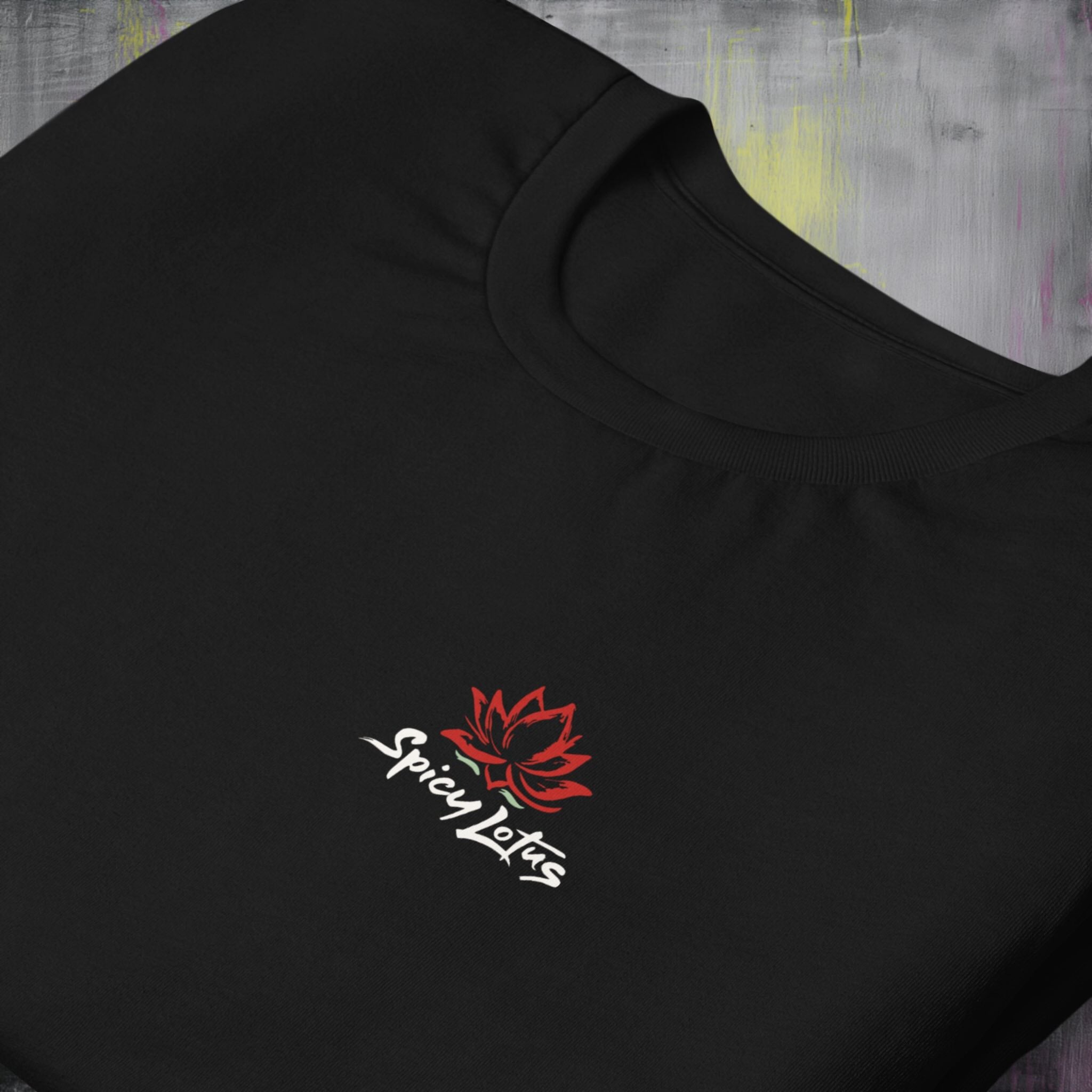 Folded Bella+Canvas 3001 unisex back print tee with chest logo