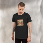 Man wearing a black t-shirt with a graphic design on a plain background