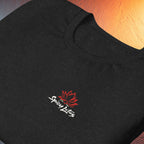 Folded Bella+Canvas 3001 unisex back print tee with chest logo